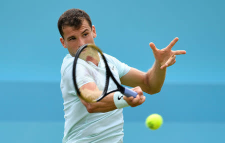 Tennis - ATP 500 - Fever-Tree Championships - The Queen's Club, London, Britain - June 19, 2018 Bulgaria's Grigor Dimitrov in action during his first round match against Bosnia's Damir Dzumhur Action Images via Reuters/Tony O'Brien