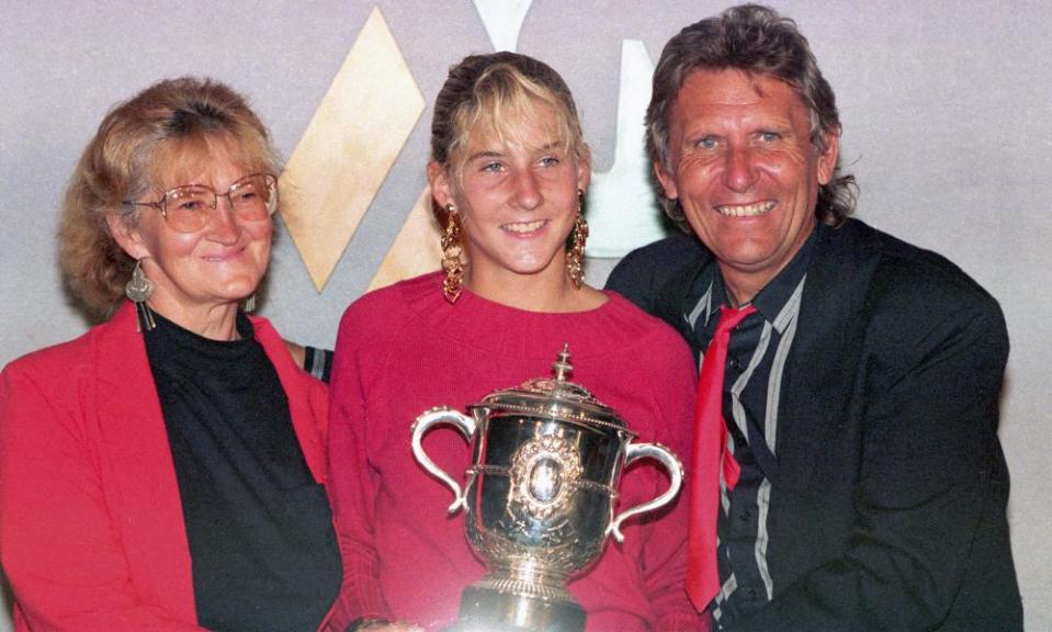 Monica Seles poses with her parents