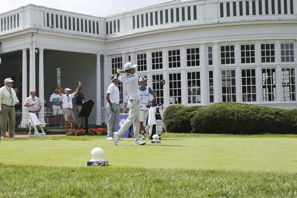 Defending champion Kevin Na tees off on the first hole during the first round of A Military Tribute at The Greenbrier golf tournament in White Sulphur Springs, W.Va, Thursday, Sept. 12, 2019. (Chris Jackson/The Register-Herald via AP)