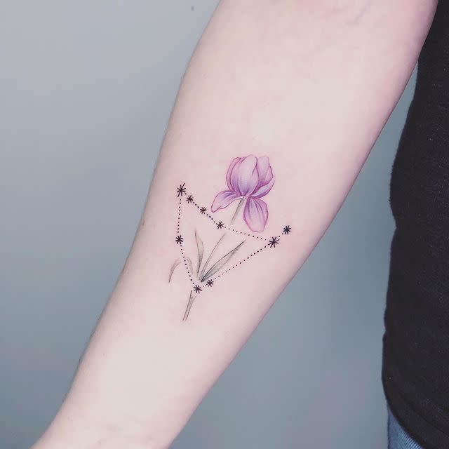 3) This Watercolor Capricorn Tattoo