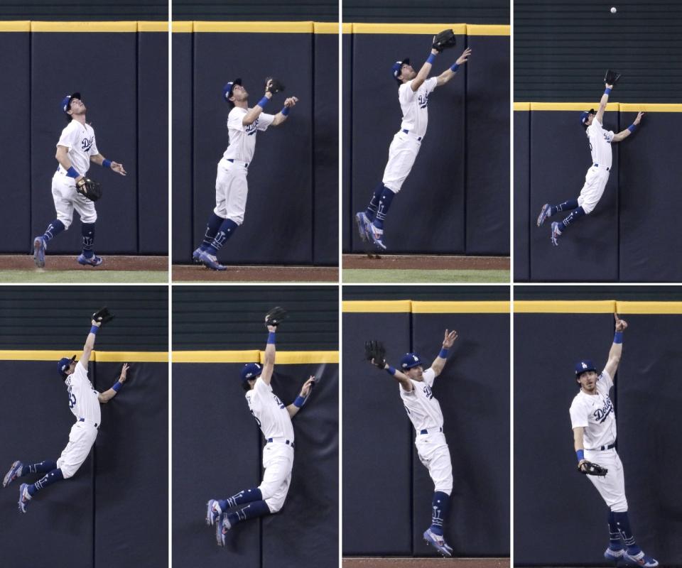 Dodgers center fielder Cody Bellinger robs San Diego's Fernando Tatis Jr. of a home run during Game 2 of the NLDS.