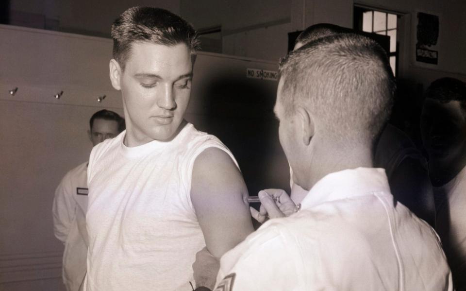 Elvis also got a series of jabs for typhoid, tetanus and Asian flu before basic training with the Second Armored division  - Bettmann