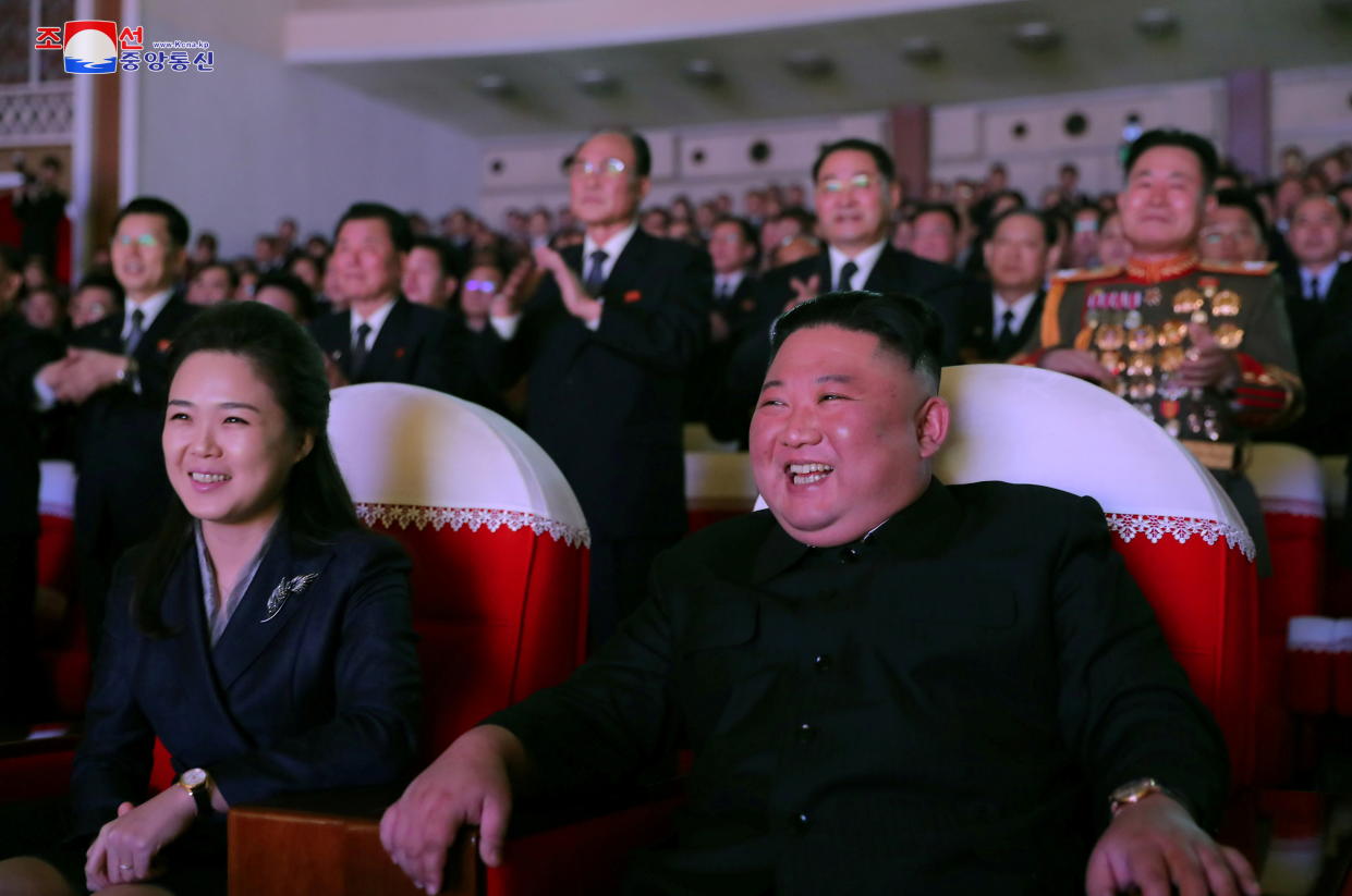 North Korean leader Kim Jong Un and his wife Ri Sol Ju watch a performance that commemorated the Day of the Shining Star, the birth anniversary of the late leader Kim Jong Il at the Mansudae Art Theatre in Pyongyang, North Korea in this undated photo released by North Korea's Korean Central News Agency (KCNA) on February 17, 2021. KCNA via REUTERS      ATTENTION EDITORS - THIS IMAGE WAS PROVIDED BY A THIRD PARTY. REUTERS IS UNABLE TO INDEPENDENTLY VERIFY THIS IMAGE. NO THIRD PARTY SALES. SOUTH KOREA OUT. NO COMMERCIAL OR EDITORIAL SALES IN SOUTH KOREA.     TPX IMAGES OF THE DAY