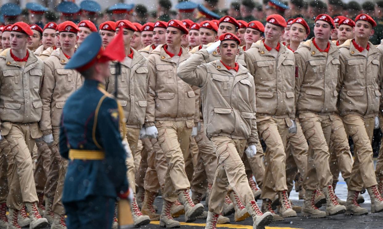 <span>Members of Russia's youth army, Yunarmiya, take part in a Victory Day parade in Moscow on 9 May.</span><span>Photograph: Natalia Kolesnikova/AFP/Getty Images</span>