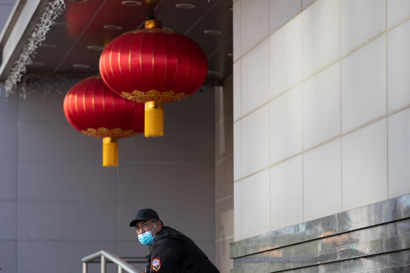 A security guard stands outside the China Consulate General in Houston, Texas