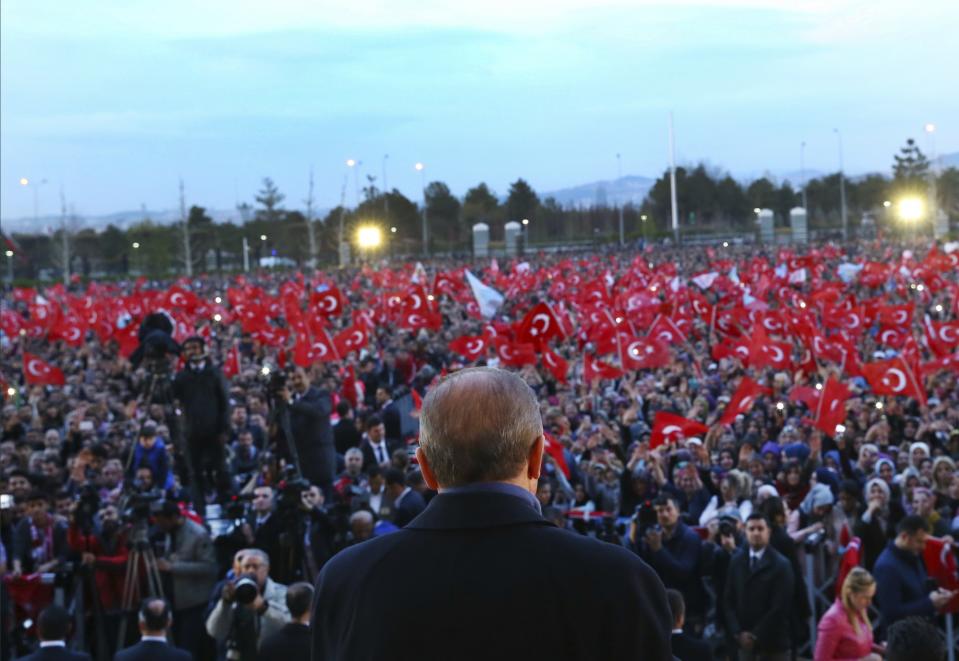 <p>Turkey’s President Recep Tayyip Erdogan delivers a speech during a rally a day after the referendum, outside the Presidential Palace, in Ankara, Turkey, Monday, April 17, 2017. Turkey’s main opposition party urged the country’s electoral board Monday to cancel the results of a landmark referendum that granted sweeping new powers to Erdogan, citing what it called substantial voting irregularities. (Press Presidency Press Service via AP, Pool) </p>