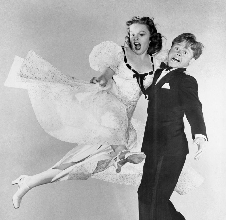 Judy Garland and Mickey Rooney in action during a scene from ˜Strike Up the Band'