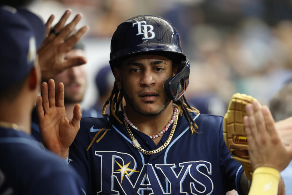 Tampa Bay Rays' Jose Siri celebrates in the dugout after scoring against the Baltimore Orioles during the sixth inning of a baseball game Saturday, July 22, 2023, in St. Petersburg, Fla. (AP Photo/Scott Audette)