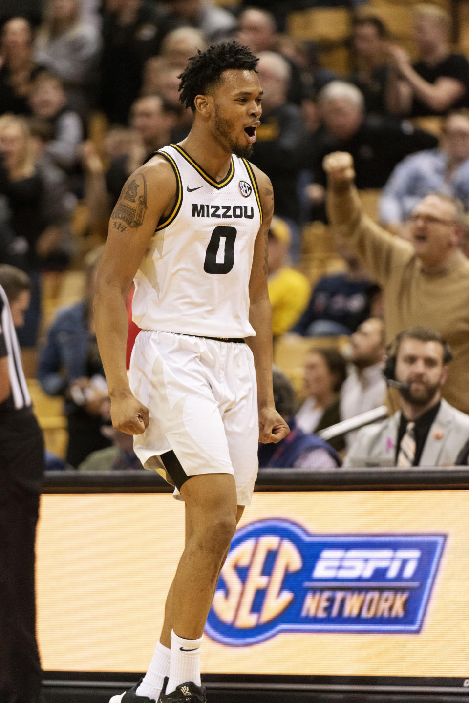 Missouri's Torrence Watson celebrates before a timeout during the second half of an NCAA college basketball game against Mississippi Tuesday, Feb. 18, 2020, in Columbia, Mo. Missouri won 71-68.(AP Photo/L.G. Patterson)