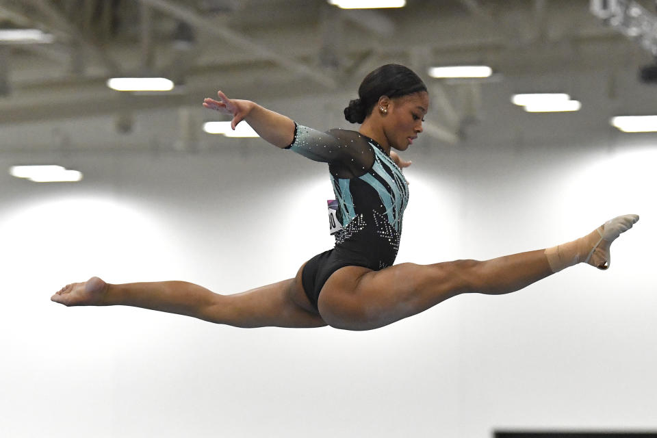 Kayla Lincoln performs on the balance beam at the USA Gymnastics Winter Cup competition in Louisville, Ky., Saturday, Feb. 24, 2024. (AP Photo/Timothy D. Easley)