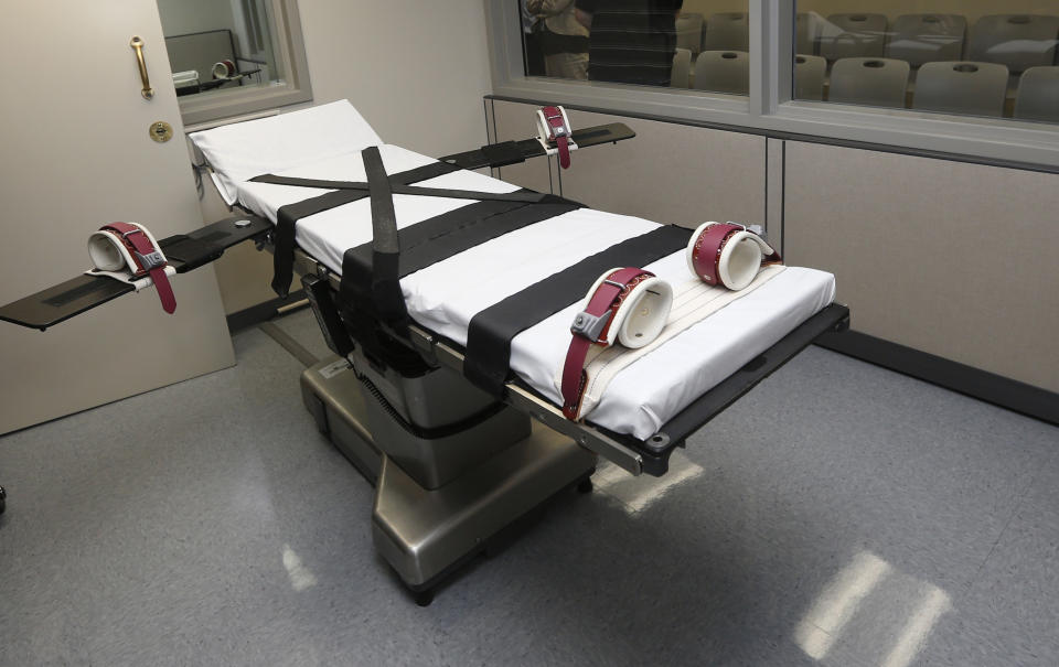 FILE - This photo shows the gurney in the execution chamber at the Oklahoma State Penitentiary in McAlester, Okla., on Oct. 9, 2014. A scheduled execution in Alabama that was called off Thursday, Nov. 17, 2022, after prison officials could not find a suitable vein to inject the lethal drugs into is the latest in a long history of problems with lethal injections since Texas became the first state to use the execution method in 1982, including delays in finding usable veins. (AP Photo/Sue Ogrocki, File)