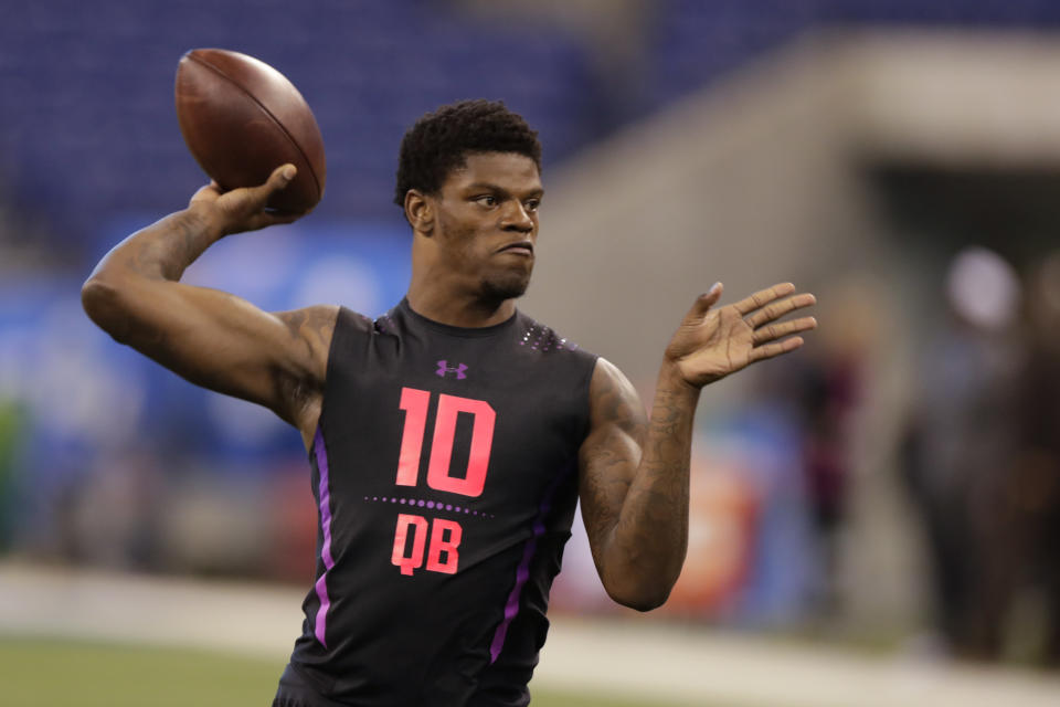 Louisville quarterback Lamar Jackson runs a drill at the NFL scouting combine in Indianapolis. (AP)