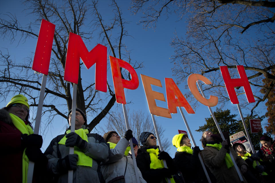 People rally in support of the impeachment of President Donald Trump in front of the Capitol as the House of Representatives begins debate on the articles of impeachment against President Donald Trump on Wednesday Dec. 18, 2019. (Photo: Caroline Brehman via Getty Images)