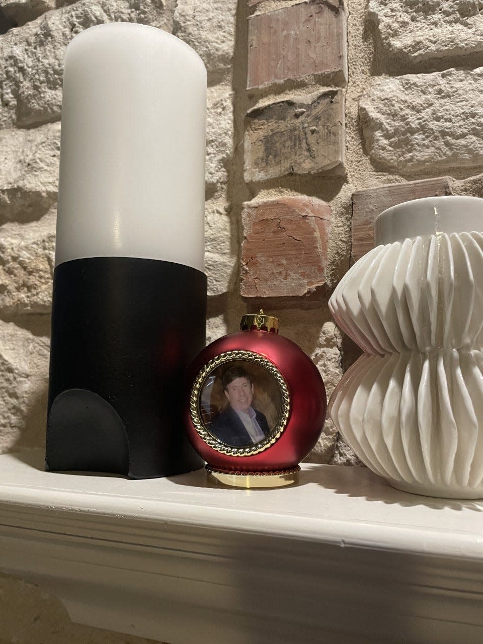 In 2019, Austin-based Keri Thomas was experiencing her first Christmas without her father, Bill Sanford. She learned about Holiday Voices and saved one of her dad's voicemails, along with an image of him, inside a red recordable ornament.