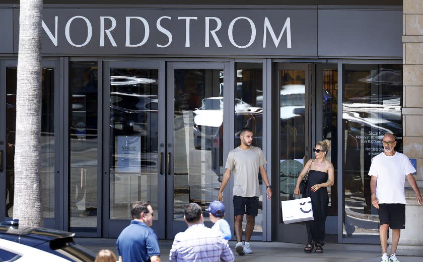 CANOGA PARK-CA-AUGUST 14, 2023: Shoppers exit the Nordstrom at the Westfield Topanga mall on August 14, 2023. Over the weekend a flash mob stormed the store where thousands of dollars in merchandise was stolen. (Christina House / Los Angeles Times)