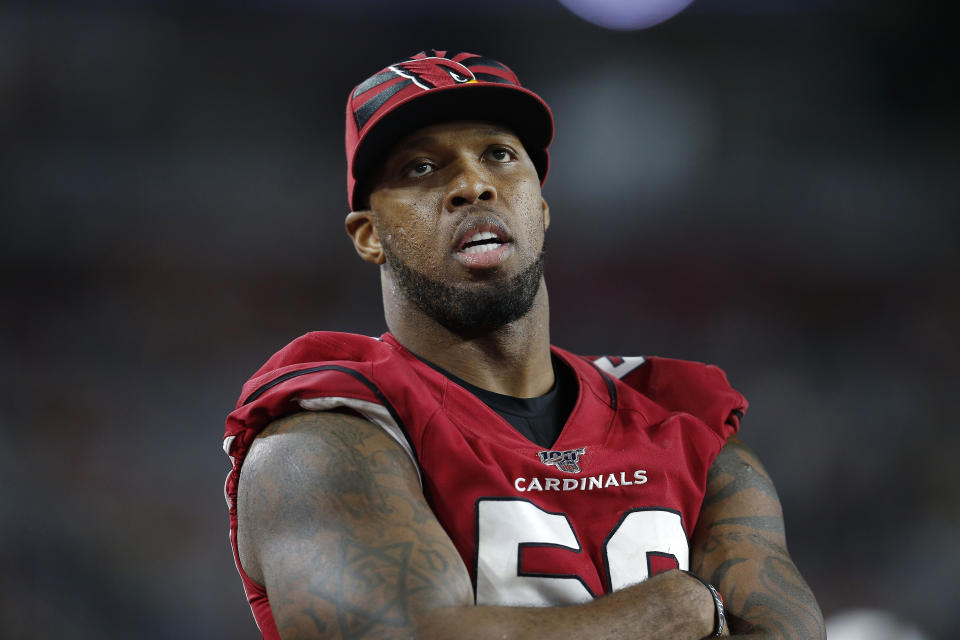 FILE - In this Aug. 15, 2019, file photo, Arizona Cardinals linebacker Terrell Suggs watches during the second half of an NFL preseason football game against the Oakland Raiders in Glendale, Ariz. The Cardinals have released the veteran linebacker on Friday, Dec. 13, 2019, with three games remaining in a disappointing season for both the player and the team. (AP Photo/Ralph Freso, File)