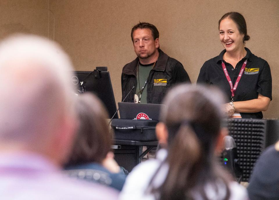 Bryan Hudson and Ashleigh Surma discuss tools to preserve indigenous languages during a conference at Indiana University Friday. Hudson speaks Shoshone.