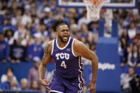 TCU center Eddie Lampkin Jr. (4) celebrates during a TCU run against Kansas during the first half of an NCAA college basketball game on Saturday, Jan. 21, 2023, at Allen Fieldhouse in Lawrence, Kan. (AP Photo/Nick Krug)