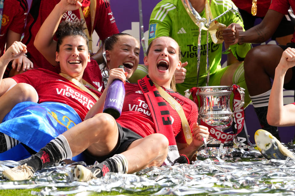 Manchester United's Ella Toone celebrates after winning the Women's FA Cup final soccer match between Manchester United and Tottenham Hotspur at Wembley Stadium in London, Sunday, May 12, 2024. Manchester United won 4-0. (AP Photo/Kirsty Wigglesworth)