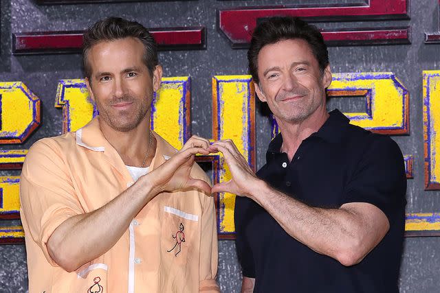 <p>Han Myung-Gu/WireImage</p> Ryan Reynolds and Hugh Jackman attend Deadpool & Wolverine press conference in Seoul