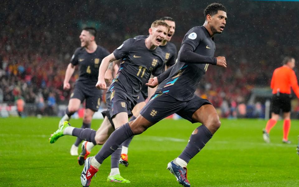 England's Jude Bellingham, right, celebrates after scoring his side's second goal