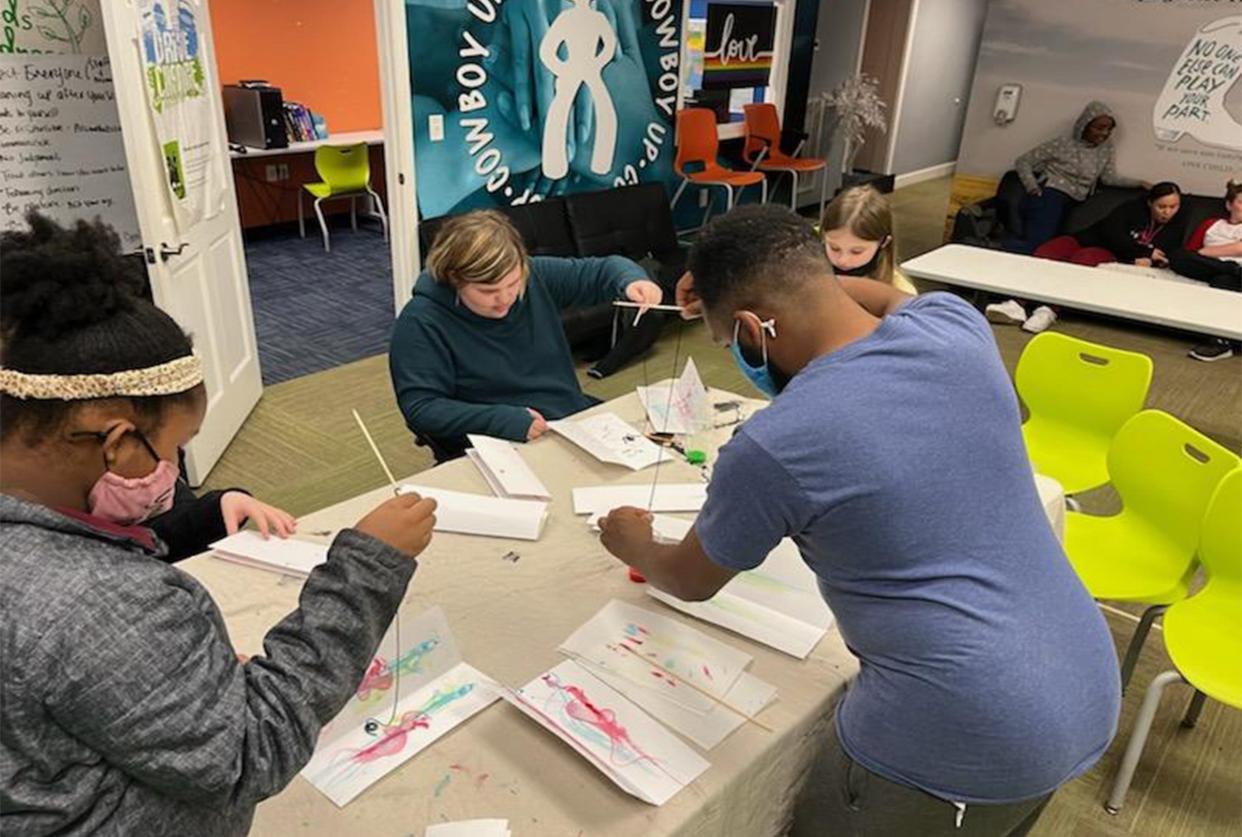 Students practice "pull string art" projects at the Boys & Girls Clubs of Maury County as part of the nonprofits new after-school art program.