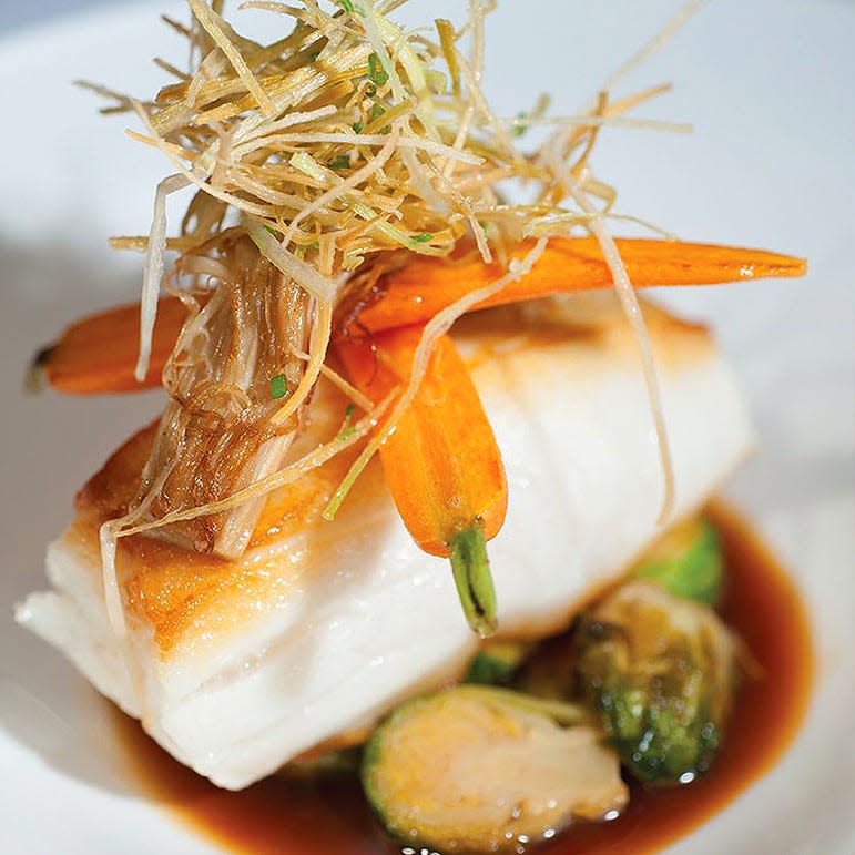 The favorite dish of PB Catch diners in 2023 was a "seacuterie" featuring Chilean sea bass.