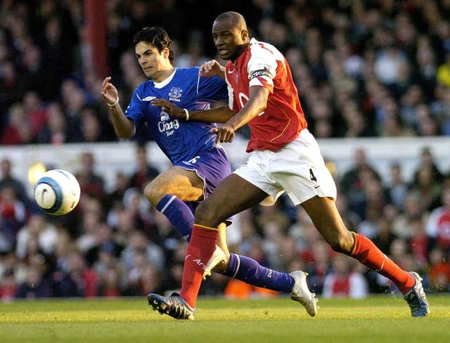 Patrick Vieira (right) in action against Mikel Arteta