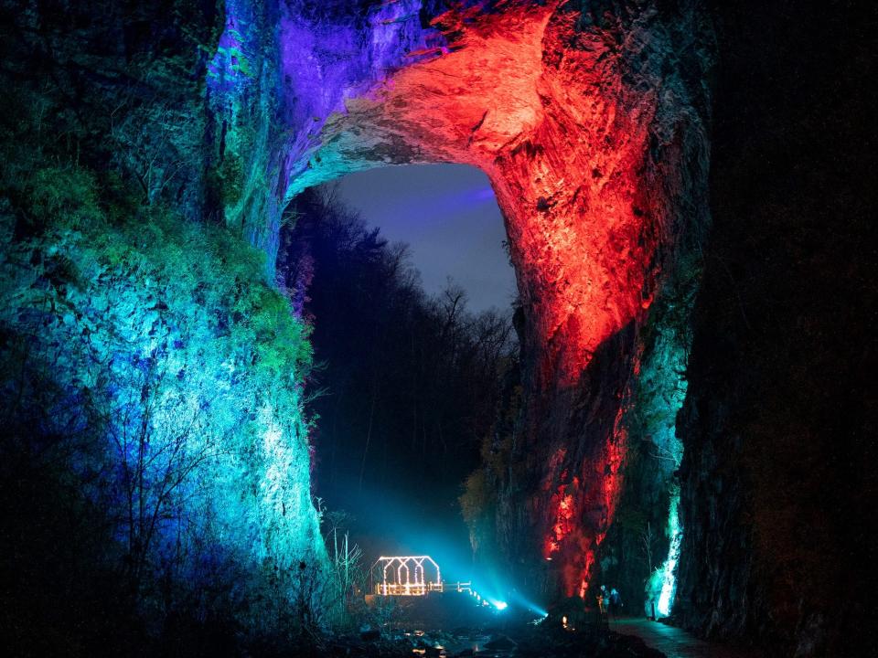 Christmas lights in red and green illuminate the Natural Bridge State Park, December 18, 2021