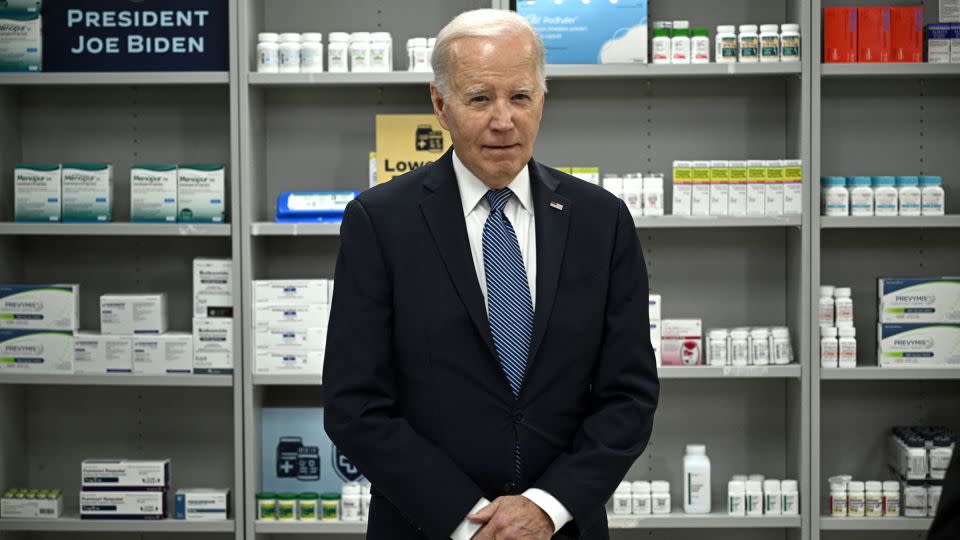 President Joe Biden listens as David Mitchell, not pictured, speaks about lowering prescription drug costs at the National Institutes of Health in Bethesda, Maryland, on December 14, 2023.  - Brendan Smialowski/AFP/Getty Images