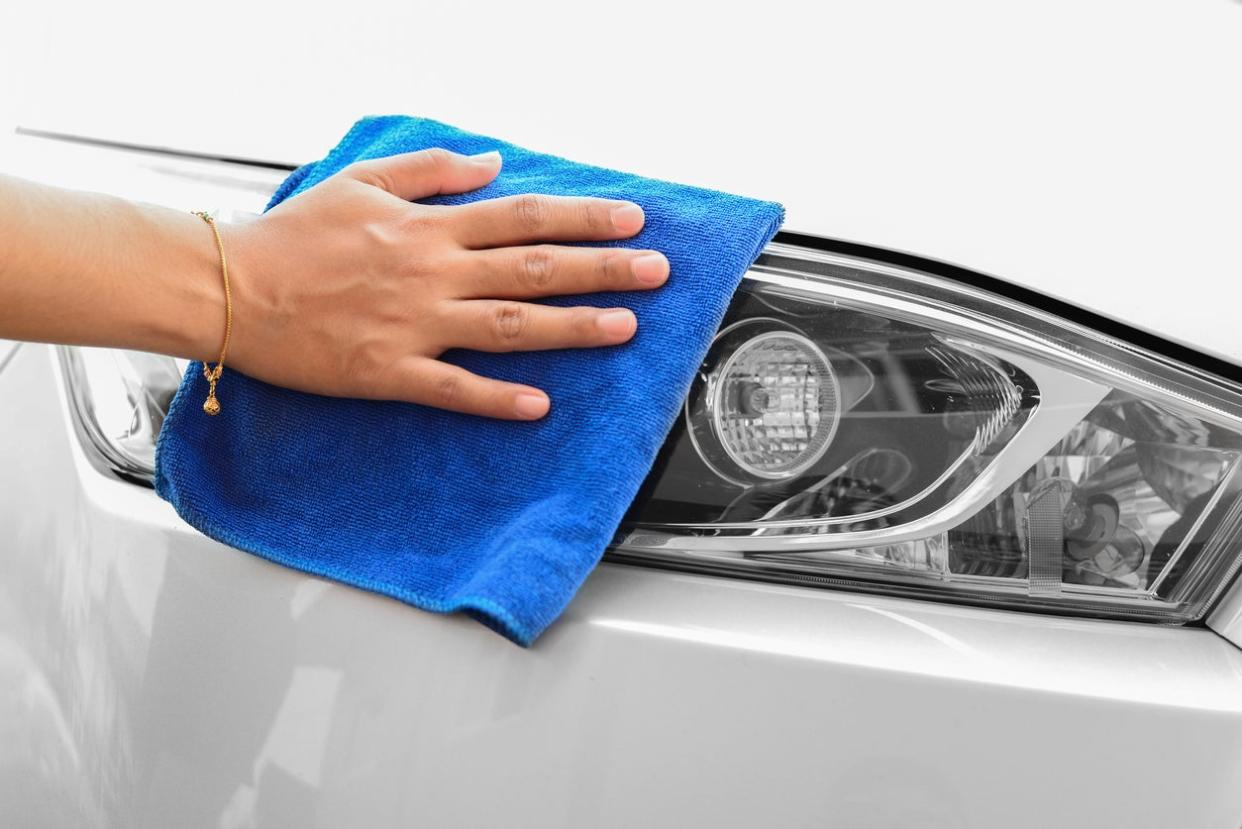 Hand Cleaning Car Headlight