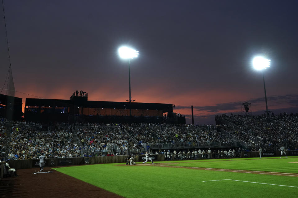 FILE - The New York Yankees play the Chicago White Sox during a baseball game in Dyersville, Iowa, Thursday, Aug. 12, 2021. Major League Baseball returns to Iowa on Thursday, Aug. 11, 2022, when the Chicago Cubs play the Cincinnati Reds in the second “Field of Dreams” game at a throwback ballpark near where the 1989 movie was filmed. (AP Photo/Charlie Neibergall, File)