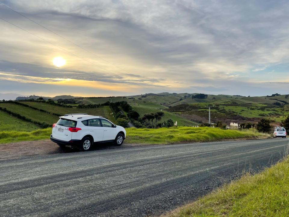 The rental car parked on the side of the road in Waiheke Island, New Zealand.