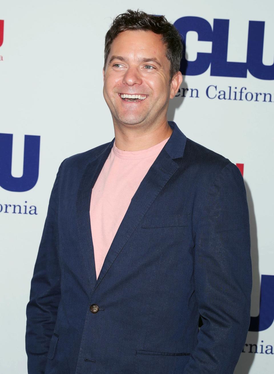 Joshua Jackson smiles big while arriving to the ACLU SoCal's 25th Annual Luncheon at the JW Marriott L.A. Live on Friday.