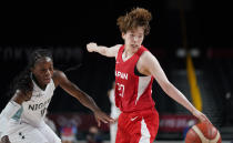 Japan's Saki Hayashi (27), right, steals the ball from Nigeria's Promise Amukamara (10), left, during women's basketball preliminary round game at the 2020 Summer Olympics, Monday, Aug. 2, 2021, in Saitama, Japan. (AP Photo/Charlie Neibergall)