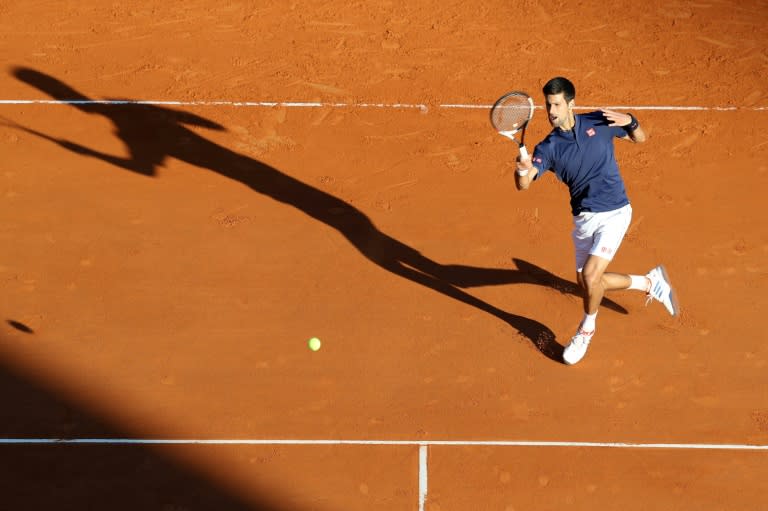 Serbian player Novak Djokovic hits a return to Spain's Pablo Carreno Busta during their Monte-Carlo ATP Masters Series Tournament tennis match, on April 20, 2017 in Monaco