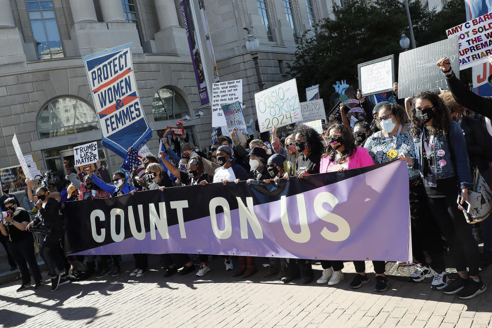Demonstrators in Washington, D.C., on Saturday. (Photo: Paul Morigi via Getty Images)