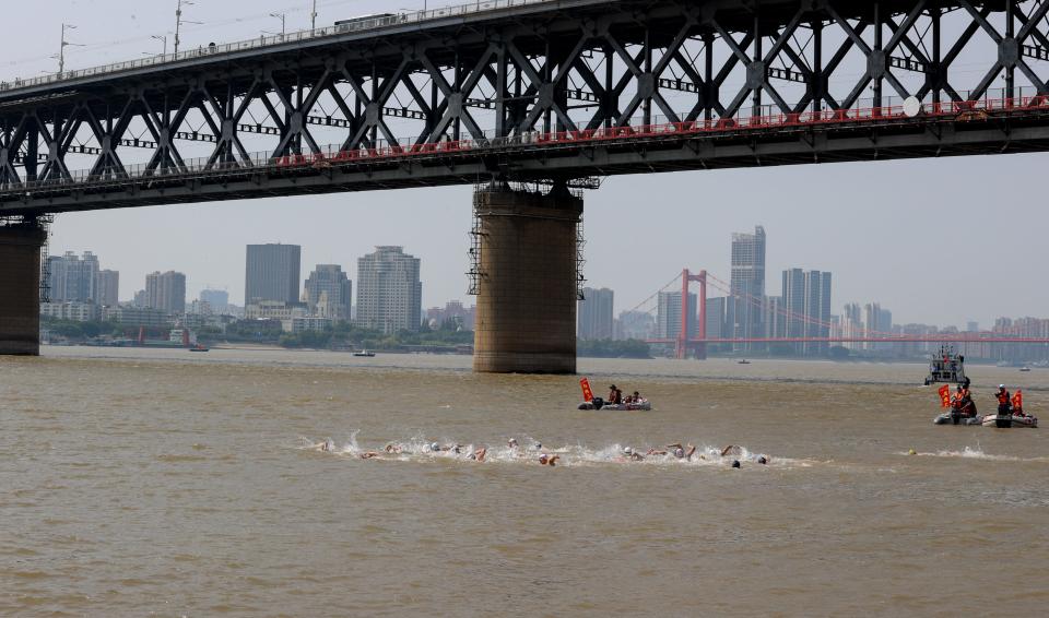 Contestants compete during the 47th Wuhan Yangtze River Crossing Festival on July 16, 2022 in Wuhan, Hubei Province of China