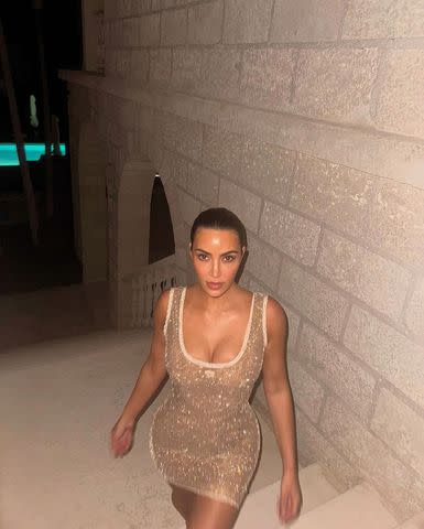 <p>Instagram/kimkardashian</p> Kim Kardashian glitters in a gold minidress in Instagram pictures captured by her 10-year-old daughter, North West