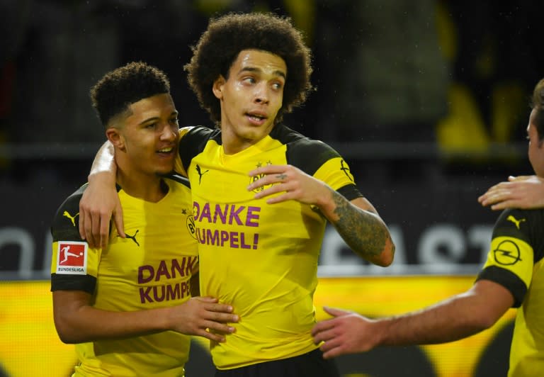 Belgian midfielder Axel Witsel (C), seen here celebrating with England international Jadon Sancho (L), says Borussia Dortmund are in a relaxed frame of mind before their first Bundesliga match of 2019 at fourth-placed RB Leipzig on Saturday