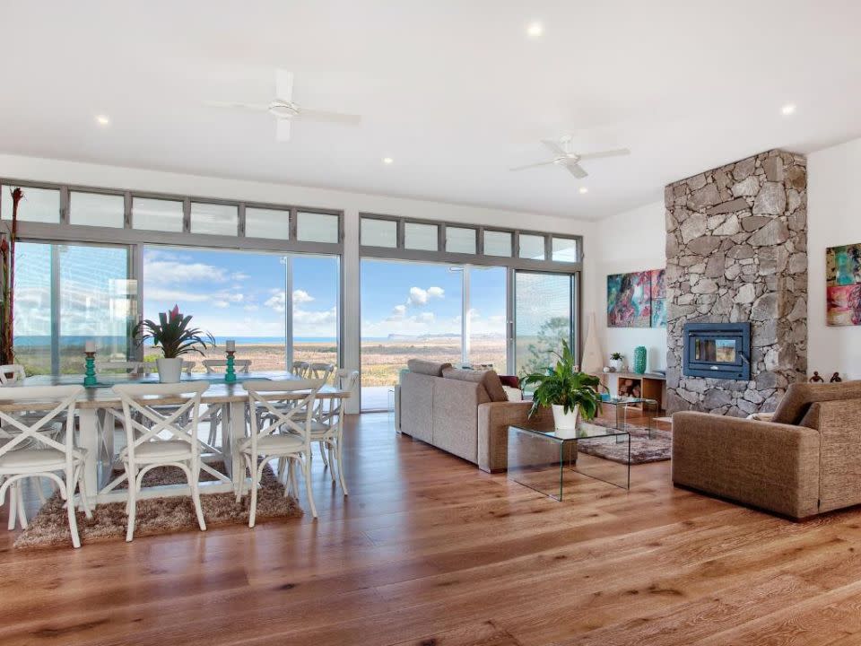 The open-plan interior features wooden oak flooring and glass floor to ceiling windows lending lots of natural light. Source: Unique Estates