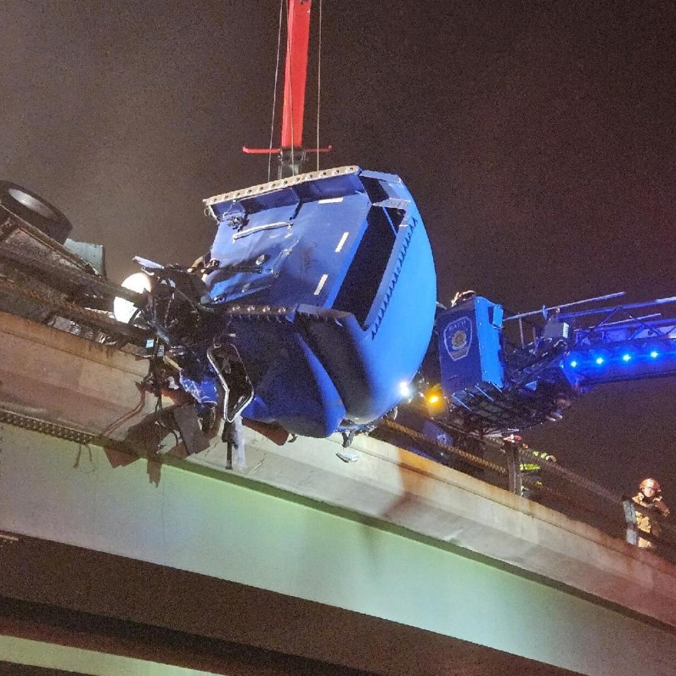 (Courtesy: John Walczak) A tractor-trailer driver was trapped in his cab after crashing on I-86.