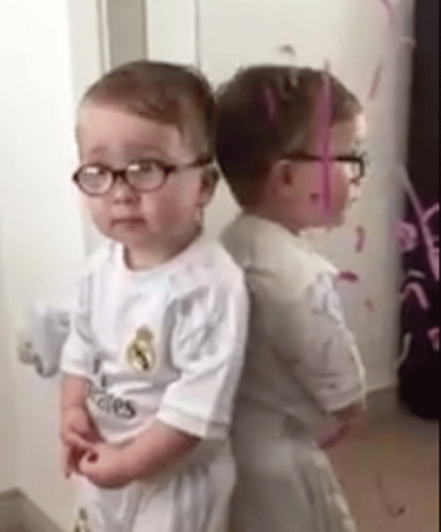 Two-year-old Noel definitely didn't draw on his mother's mirror with her pink lipstick. Photo: YouTube