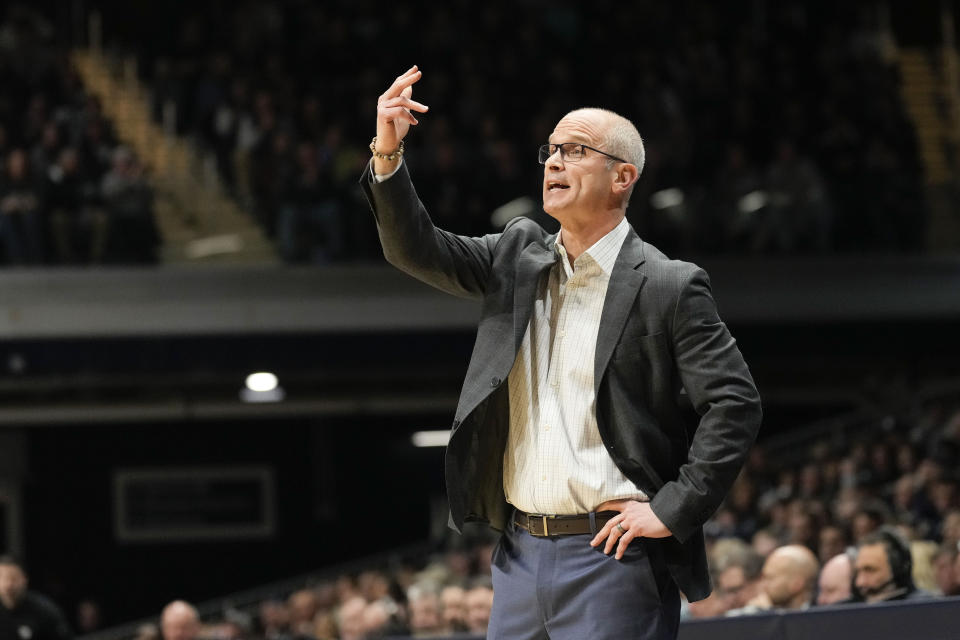 Connecticut head coach Dan Hurley calls to his players as his team plays against Butler in the first half of an NCAA college basketball game in Indianapolis, Saturday, Dec. 17, 2022. (AP Photo/AJ Mast)