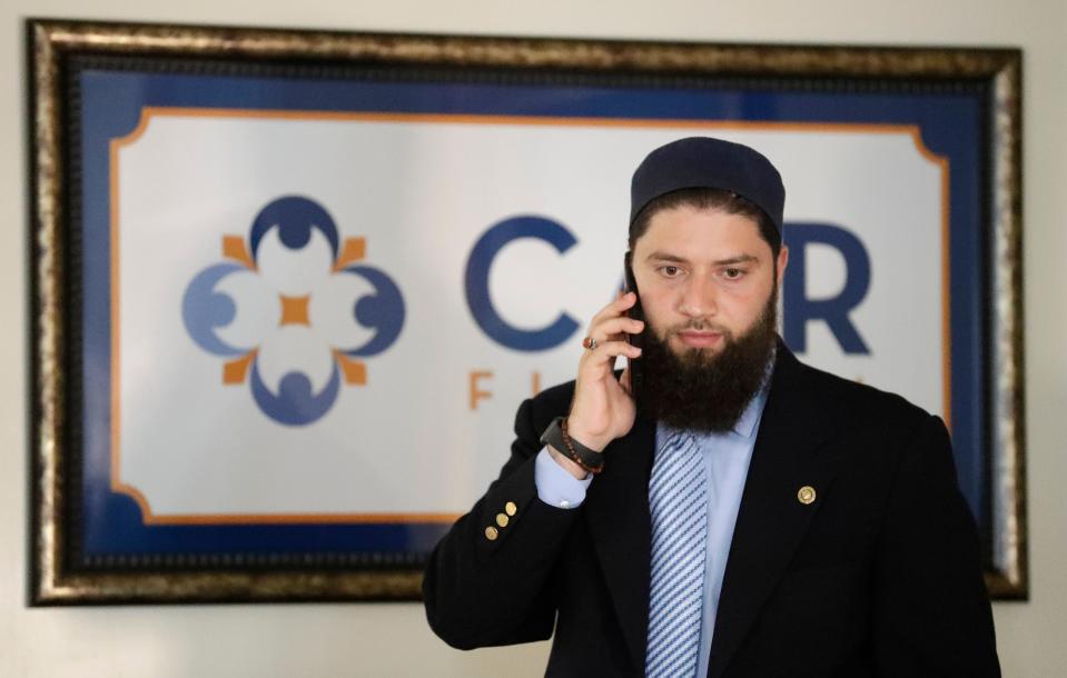 Hassan Shibly, an attorney for Hoda Muthana, speaks on the phone from his office in Tampa, Fla., on Feb. 20, 2019.