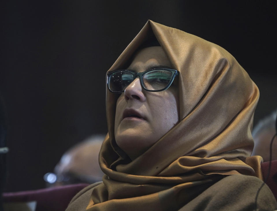 Hatice Cengiz, Turkish finance of slain journalist Jamal Khashoggi, listens during an event organized to mark the 40th day of the death of the Saudi writer, in Istanbul, late Sunday, Nov. 11, 2018. Officials from Saudi Arabia, the United States, Germany, France and Britain have listened to audio recordings related to the killing of journalist Jamal Khashoggi at the Saudi Consulate in Istanbul, Turkey's President Recep Tayyip Erdogan said Saturday, Nov. 10, in the first public acknowledgement of the existence of tapes of the slaying.(AP Photo/Neyran Elden)