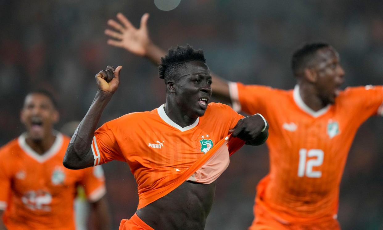 <span>Oumar Diakité celebrates after his last-gasp goal in extra time puts Ivory Coast in front against Mali.</span><span>Photograph: Sunday Alamba/AP</span>