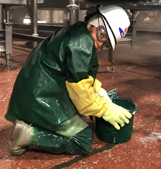 This photo, included in the Department of Labor court filings, shows a Packers Sanitation Services Inc. employee at the JBS Beef Plant in Grand Island, Nebraska.