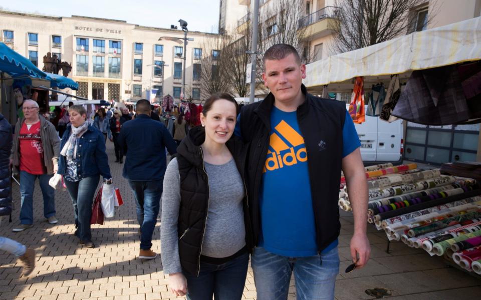 Fabrice Leglin, 29, bus conductor from Hayange with his wife - Credit: Magali Delporte