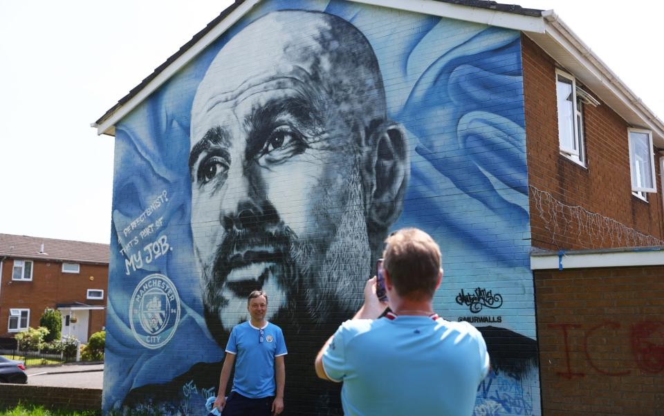 Pep Guardiola mural - Pep Guardiola: Judge Manchester City on FFP charges now to end whispering campaign - Reuters/Lee Smith